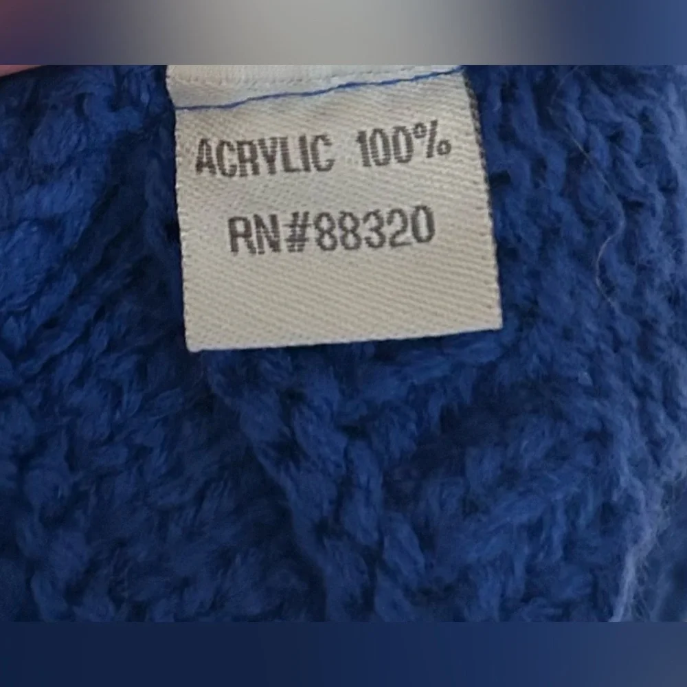 NWOT blue Pompom CC beanie.
